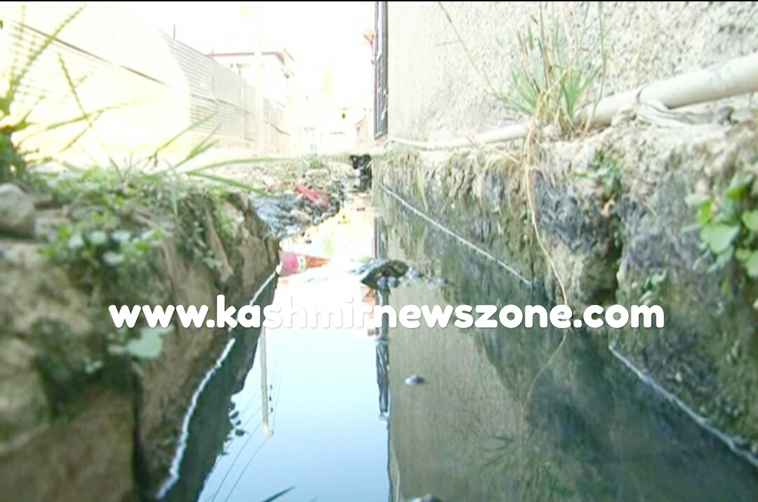 Residents Of Alamdar Colony (C) Lal Bazar Protest inoperative Drainage System.