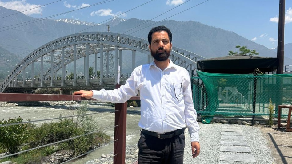 DMO Budgam Er Zulfikar Mohd Shafi greets people on Eid-ul-Adha