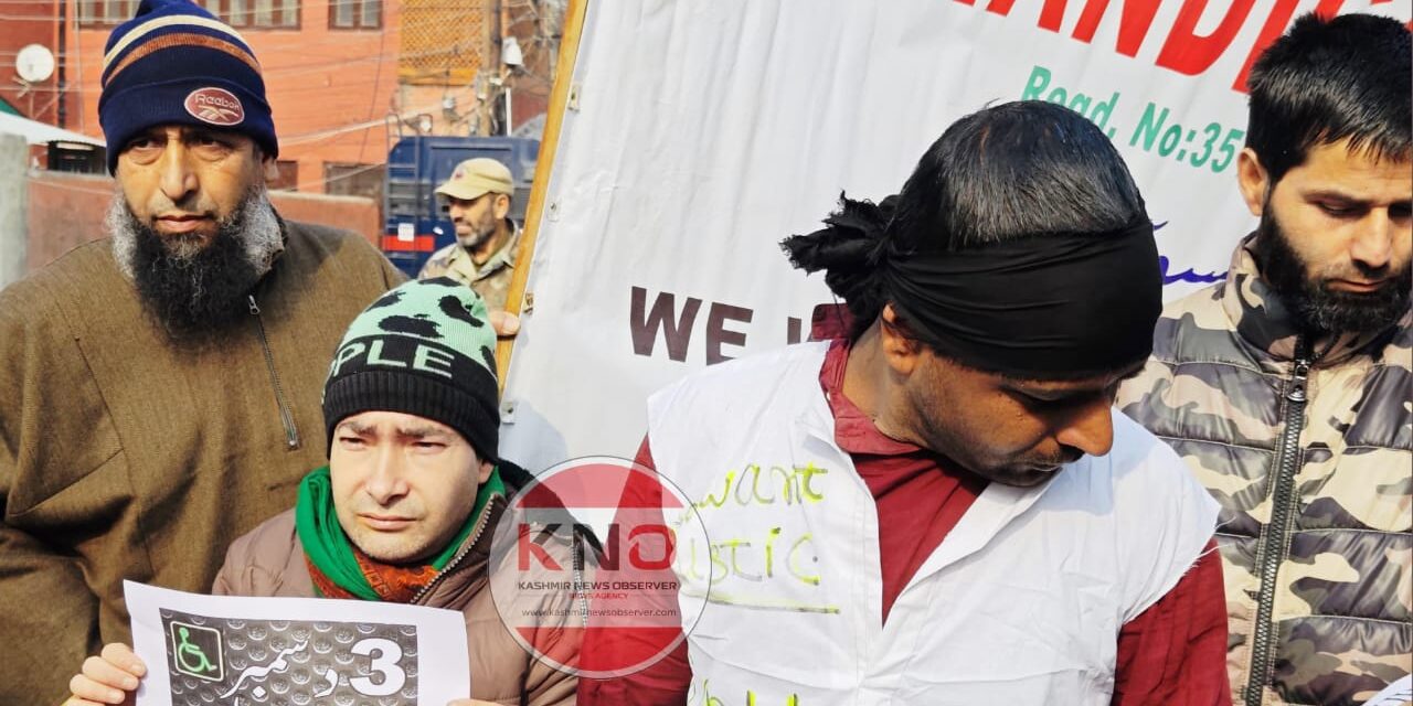 J&K handicapped association protest in Srinagar, observe World Disability Day as “black day”